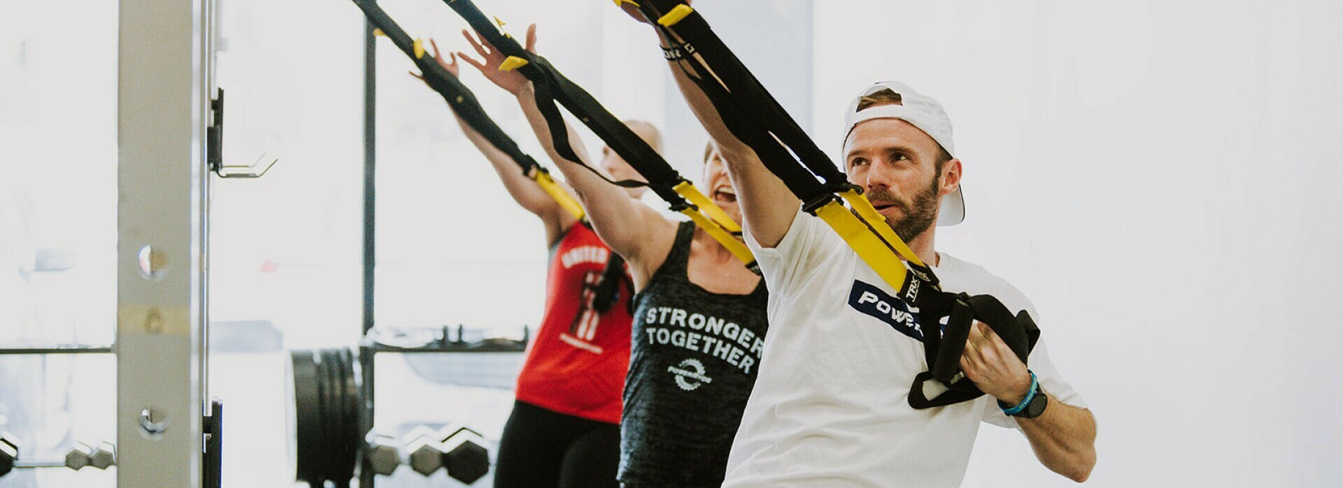 three people exercising